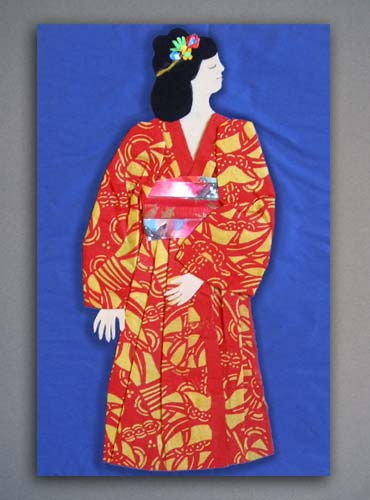 Folded and cut paper illustration of a Japanese doll.